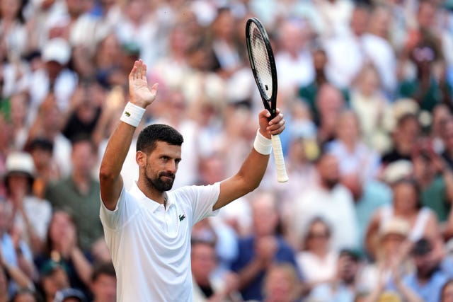 Novak Djokovic waves to the Centre Court crowd