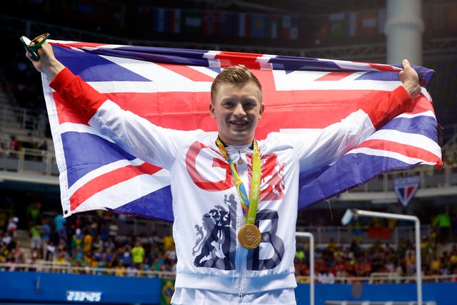 Adam Peaty will look to defend his 100m Olympic breaststroke title this summer (Owen Humphreys/PA)