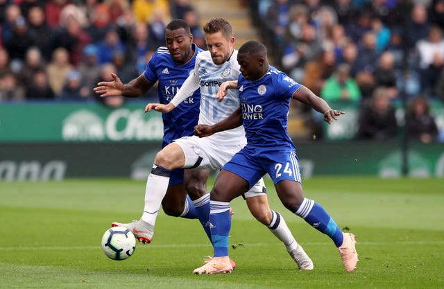 Wes Morgan, left, was sent off for the Foxes 