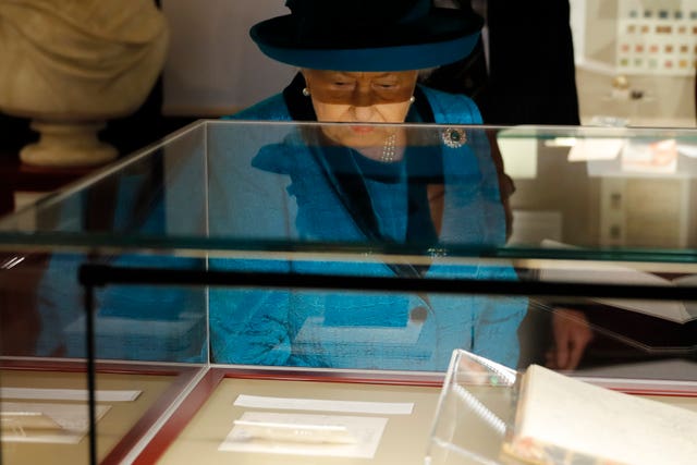The Queen during a visit to the new headquarters of the Royal Philatelic Society in London