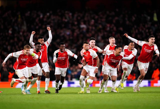 Arsenal players celebrate after winning the penalty shoot-out against Porto