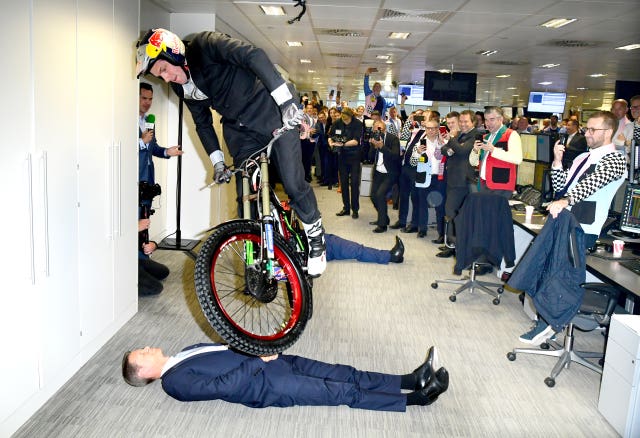 A stunt cyclist performs
