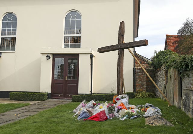 Floral tributes left outside Chinnor Community Church in Oxfordshire