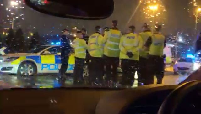 Videograb showing police officers outside the Star City cinema in Birmingham