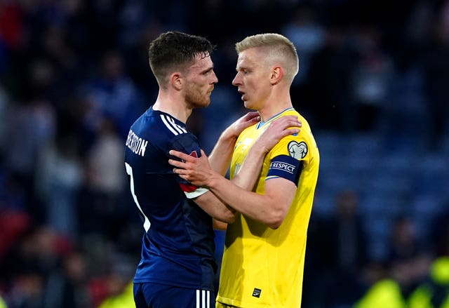 Scotland’s Andrew Robertson (left) speaks to Ukraine’s Oleksandr Zinchenko at the end of the FIFA World Cup 2022 Qualifier play-off semi-final match at Hampden Park in June 