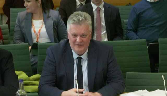Bank of England chief economist Huw Pill smiling during a hearing of the Treasury Select Committee