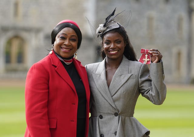 Aluko with her mother Sileola after being made an MBE (Andrew Matthews/PA)