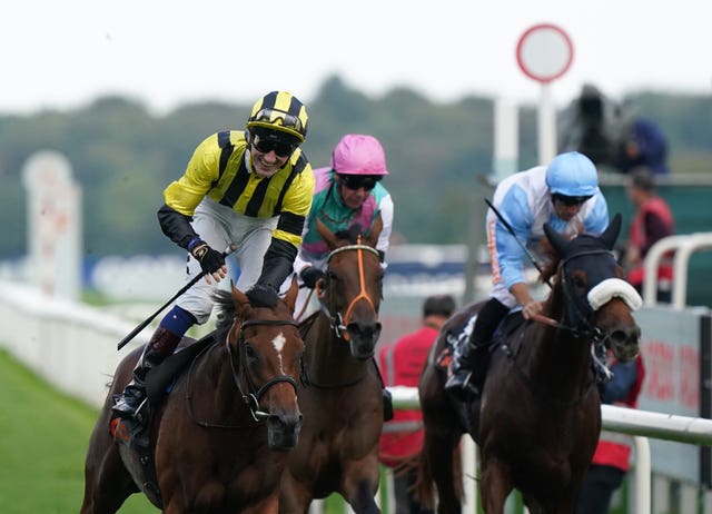 David Egan celebrates Classic glory at Doncaster with Eldarov (left)