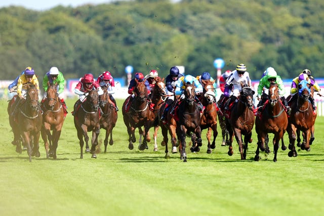 American Affair(far left in yellow) was delivered late by Paul Mulrennan 