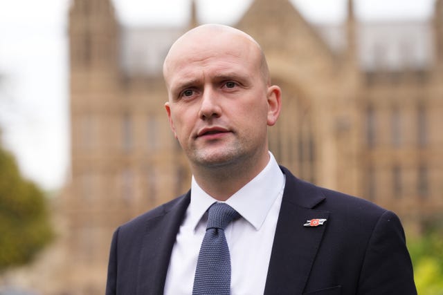 Headshot of Stephen Flynn outside Parliament