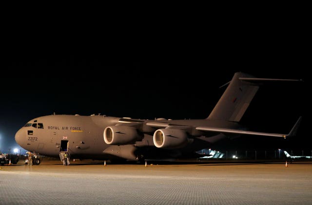 British military personnel depart a C-17 aircraft at RAF Brize Norton, Oxfordshire after the final airlift from Afghanistan (Peter Nicholls/PA)