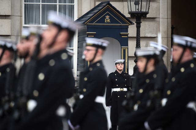 Royal Navy perform the Changing of the Guard ceremony