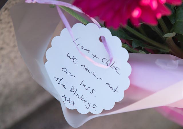 Flowers laid outside South Shields town hall, the home town of victims Chloe Rutherford and Liam Curry (Tom White/PA)
