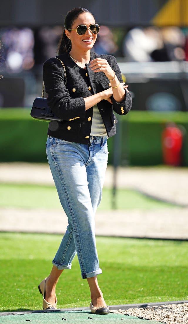 Meghan laps up the sunshine (Aaron Chown/PA)