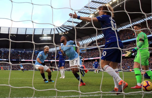 Raheem Sterling, centre, celebrates scoring against Chelsea