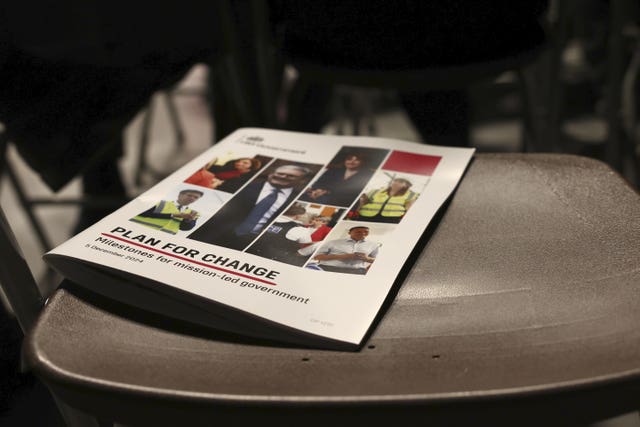 A programme lies on a chair before the speech 