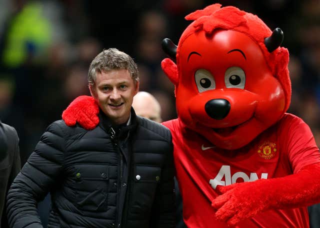 Then Cardiff manager Ole Gunnar Solskjaer and Manchester United mascot Fred The Red at Old Trafford