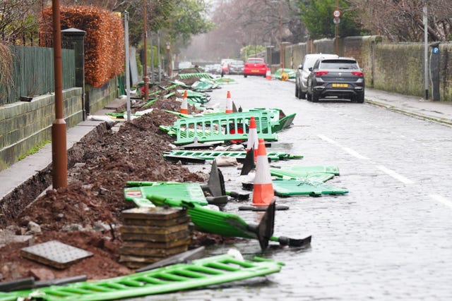 Fencing lying on road