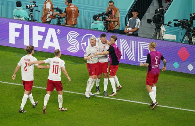 Andreas Christensen, centre, celebrates his goal against France