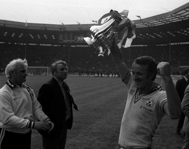 Southampton captain Peter Rodrigues (right) celebrates with the FA Cup in 1976 at Wembley