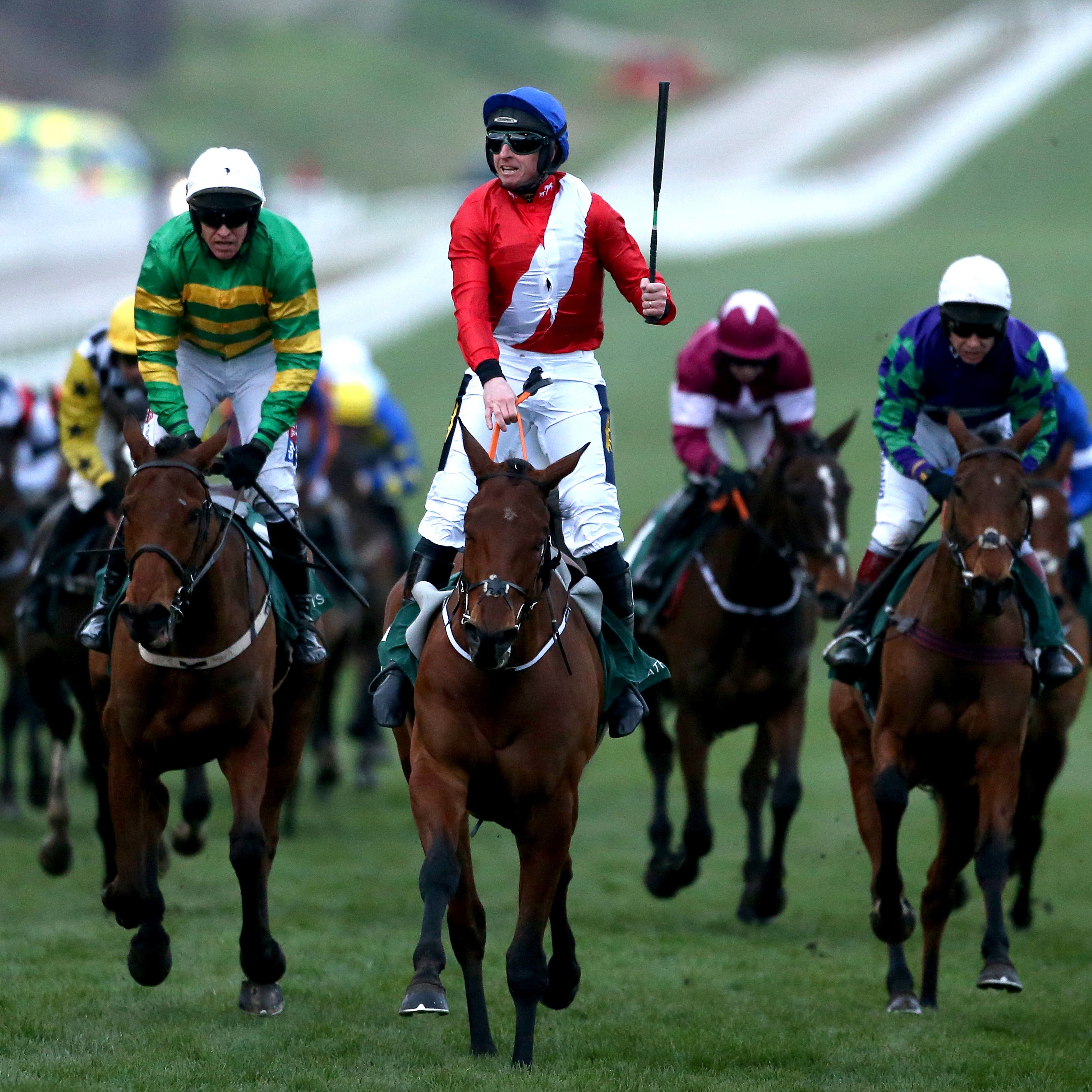 Envoi Allen (centre) wins the Weatherbys Champion Bumper at Cheltenham
