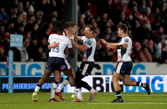 Owen Farrell celebrates scoring the winning drop-goal against Gloucester on Friday night