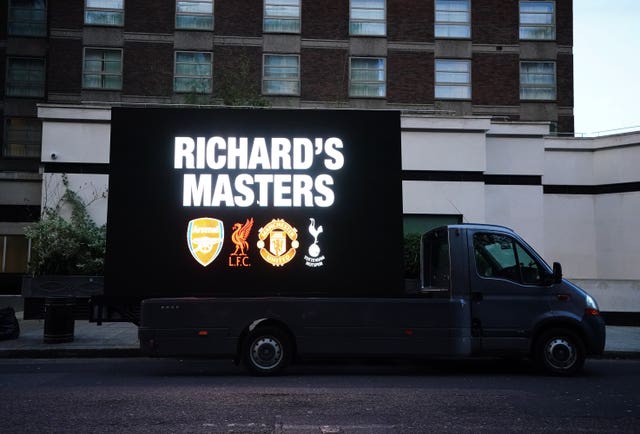 A protest sign aimed at Premier League chief executive Richard Masters in London