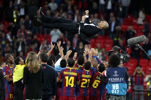 Barcelona coach Pep Guardiola is thrown into the air by his players after victory in the 2011 Champions League final 