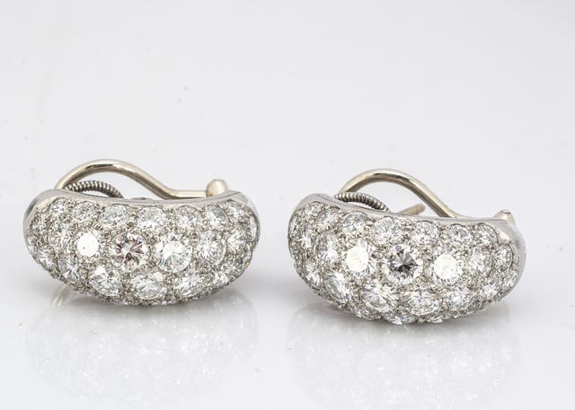 Undated handout photo issued by Special Auction Services of a pair of Oscar Heyman of New York diamond encrusted cuff earrings, owned by the late Baroness Betty Boothroyd. 