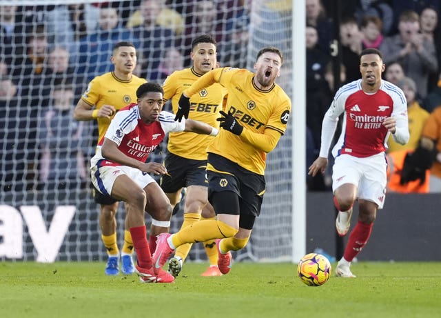 Arsenal’s Myles Lewis-Skelly appears to foul Wolves' Matt Doherty