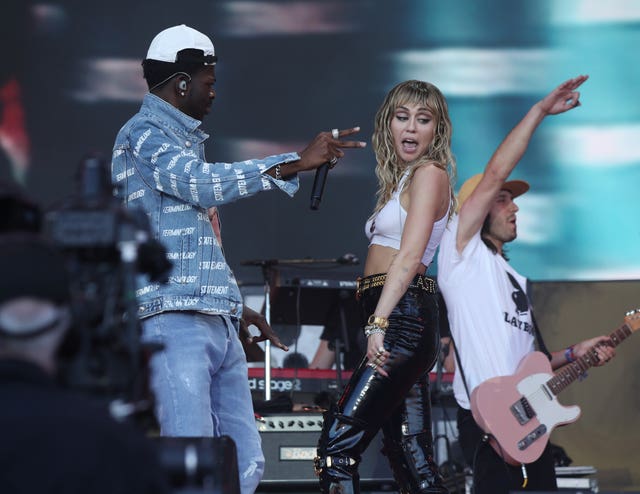 Miley Cyrus performing on the Pyramid Stage
