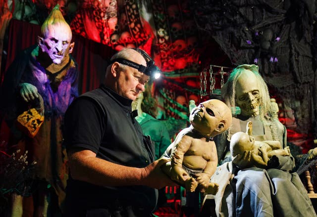 Electrician Ken Carraher continues preparations on his Halloween House of Horrors in Killiney, Dublin