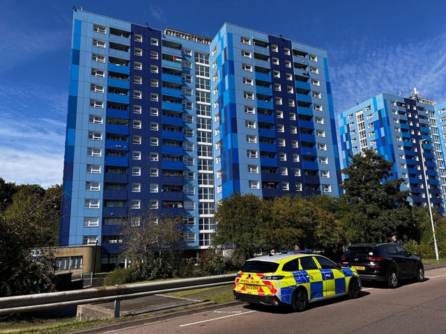 Officers outside a property in Leabank, Luton