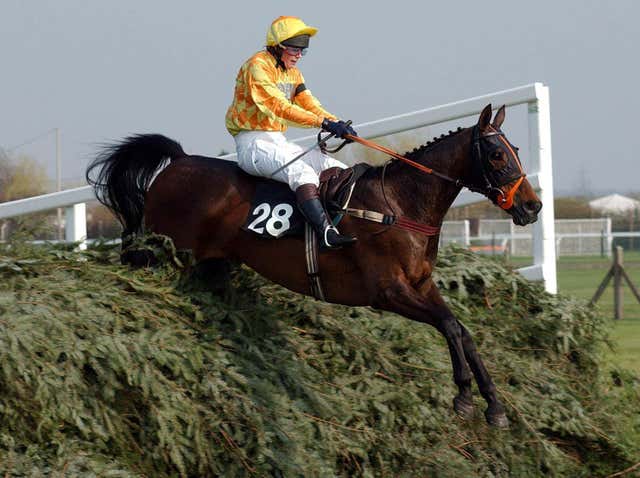 Polly Gundry and Torduff Express jumps the last in the Fox Hunters' Chase at Aintree 
