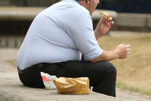 Man eating fast food