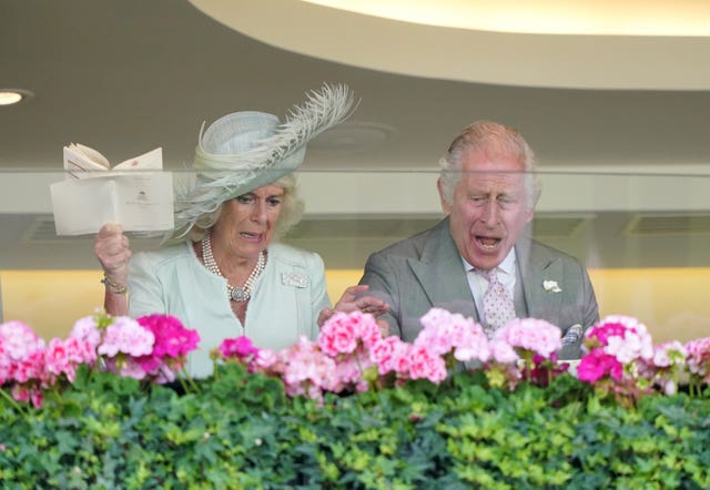 The King and Queen celebrate after Desert Hero's win at Royal Ascot