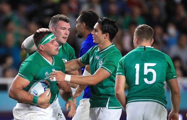 CJ Stander, left, celebrates Ireland's sixth try 