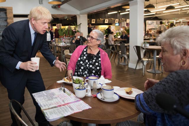 Conservative Party leadership contender Boris Johnson meets customers during a visit to Polhill Garden Centre near Halstead in Kent 