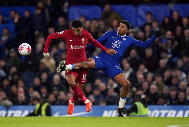 Liverpool’s Cody Gakpo, left, and Chelsea''s Wesley Fofana battle for the ball