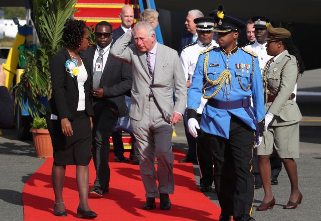 Charles being greeted at Hewanorra International Airport