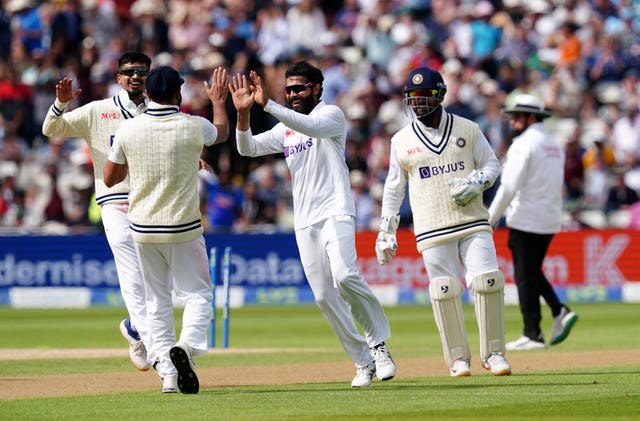 India’s Ravindra Jadeja (centre) celebrates the run out of England’s Alex Lees