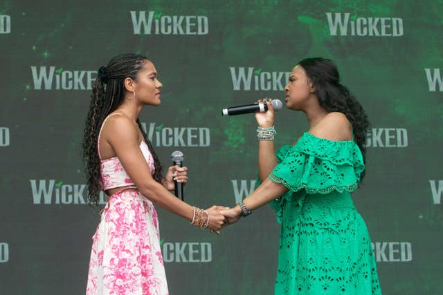 Members of the cast of Wicked on stage