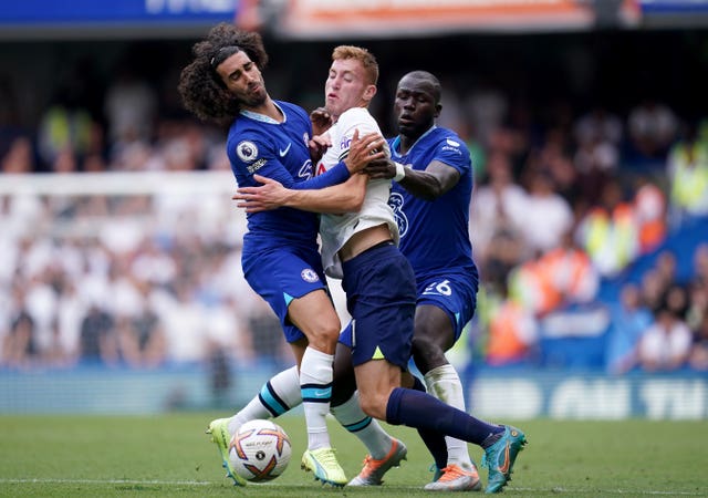 Dejan Kulusevski is sandwiched by Chelsea's Marc Cucurella, left, and Kalidou Koulibaly 