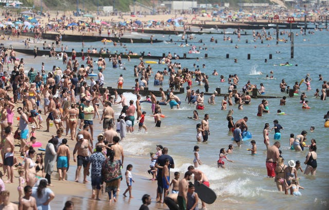 Crowds gathered on the beach in Bournemouth on Thursday