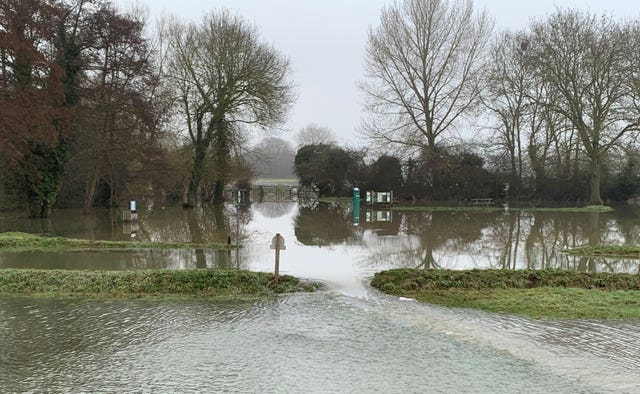 Flooding closes the road past Cookham Moor after the Thames burst its banks near the Berkshire village 