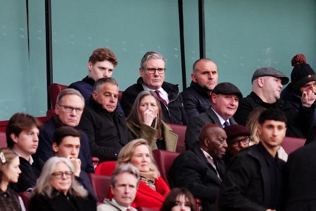 Prime Minister Sir Keir Starmer, centre rear, watches on from the stands during Arsenal's win over Sunderland