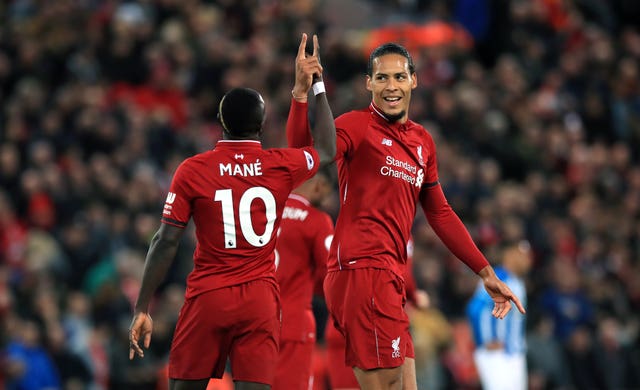 Sadio Mane celebrates scoring Liverpool's second goal against Huddersfield with Virgil van Dijk