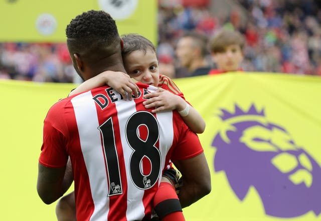 Jermain Defoe and Sunderland fan Bradley Lowery embrace (PA Wire)