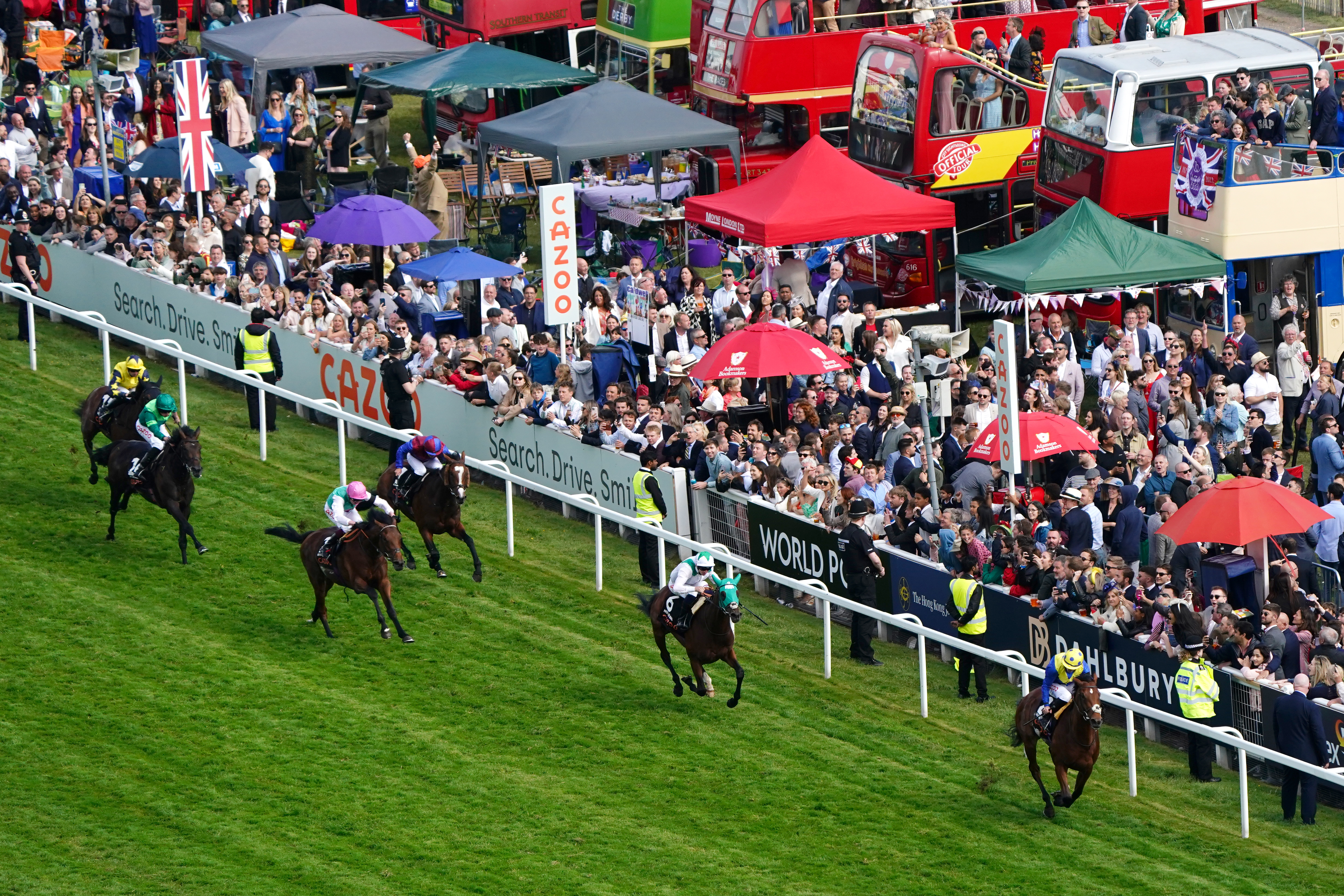 Desert Crown ridden by Richard Kingscote (right) goes on to win The Cazoo Derby on Derby Day during the Cazoo Derby Festival 2022 at Epsom Racecourse