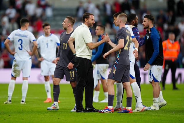 Gareth Southgate, centre left, congratulates Adam Wharton after England's win over Bosnia and Herzegovina